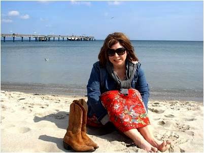 the antiques diva on the beach in germany, cowboy boots, 